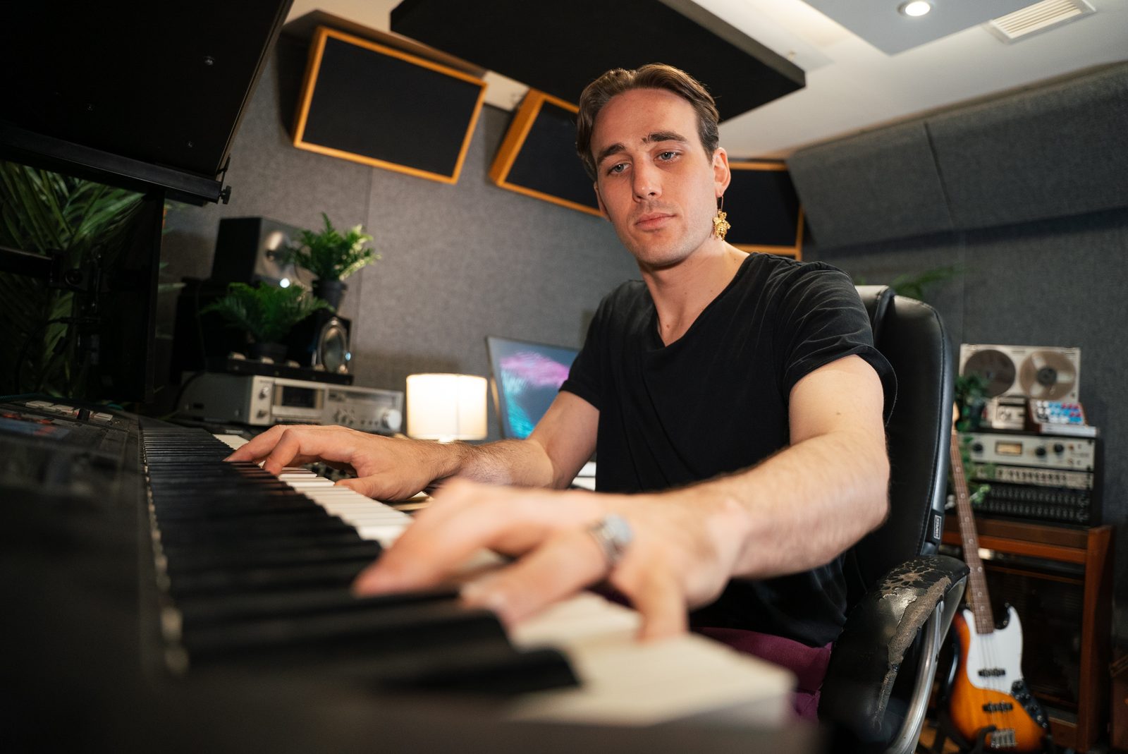 Guy Jones playing keys in his studio